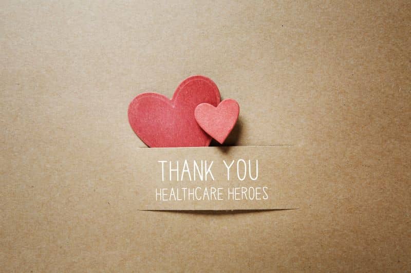 Thank You Healthcare Heroes message with handmade small paper hearts. Thank You Healthcare Heroes message with handmade small paper hearts.