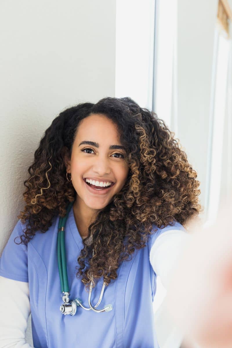 Portrait of cheerful young adult female nurse Portrait of cheerful young adult female nurse