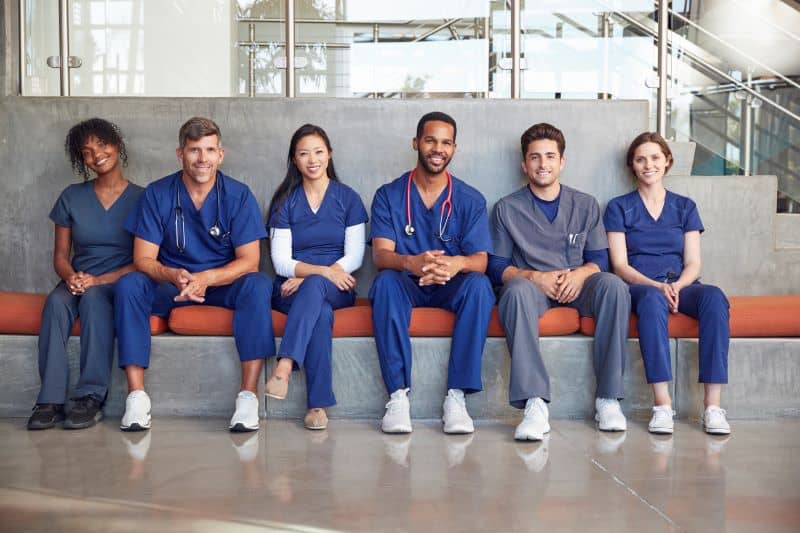 Healthcare workers sitting in a modern hospital Healthcare workers sitting in a modern hospital