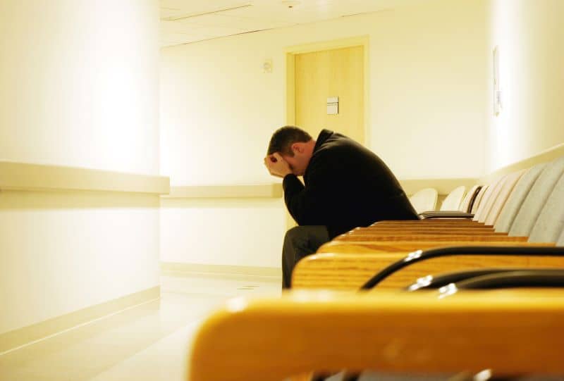 A worried patient patiently await results. A worried patient patiently await results.